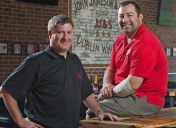 Business Courier, July 18, 2014: "Salvaged materials find new life at Mac's Pub"