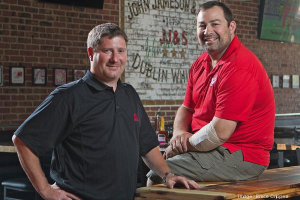 Business Courier, July 18, 2014: "Salvaged materials find new life at Mac's Pub"